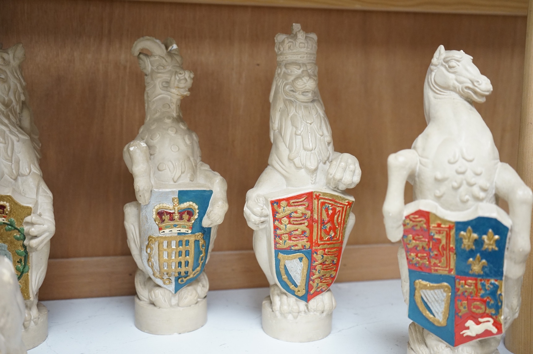 James Woodford, ten painted plaster figures of the Queen's Beasts, inscribed and dated 1953, 26cm high
